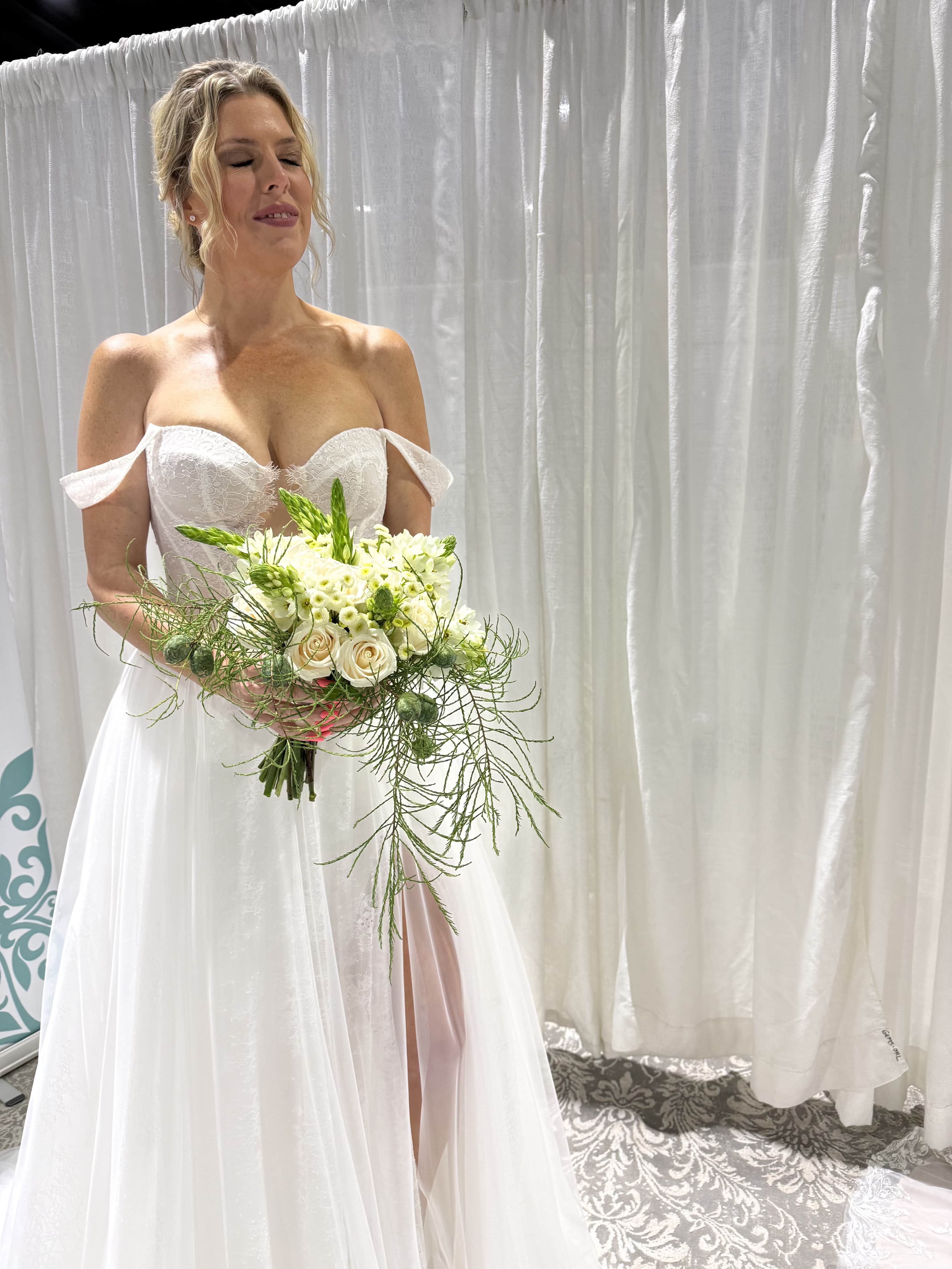 Luxury White Bridal Bouquet - An elegant collection of premium white blooms designed with soft texture and timeless beauty. A romantic statement bouquet for the bride seeking a classic and luxurious wedding style.