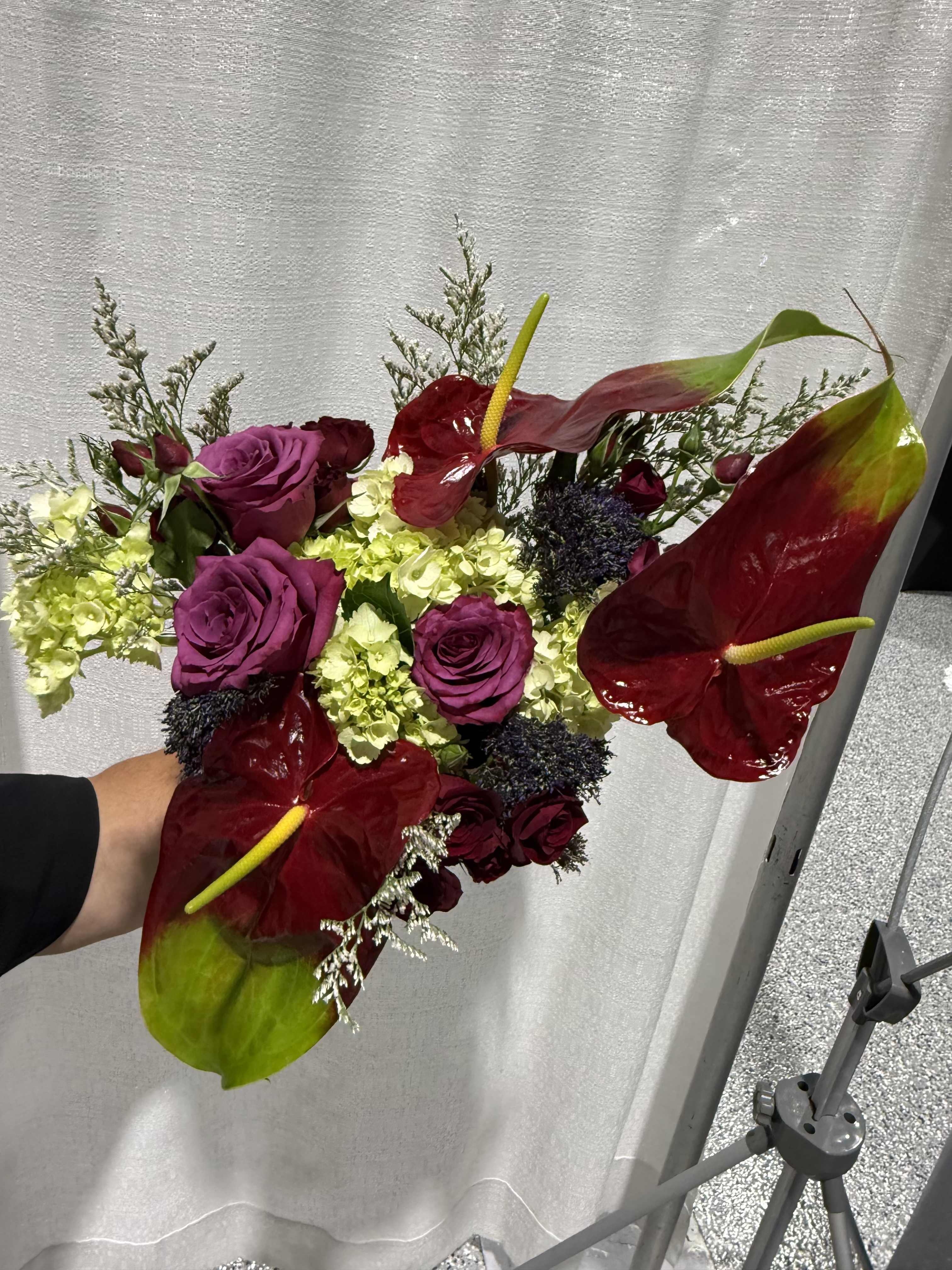 Tropical Elegance Bridal Bouquet - A romantic blend of luxurious anthuriums and fresh florals, designed to create a timeless yet modern bridal look. Perfect for destination, garden, or contemporary weddings.