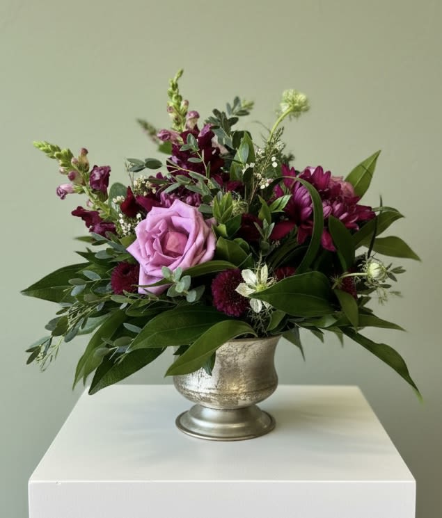 Purple Melody - An elegant mix of purples and greens mend together in a compote vase 