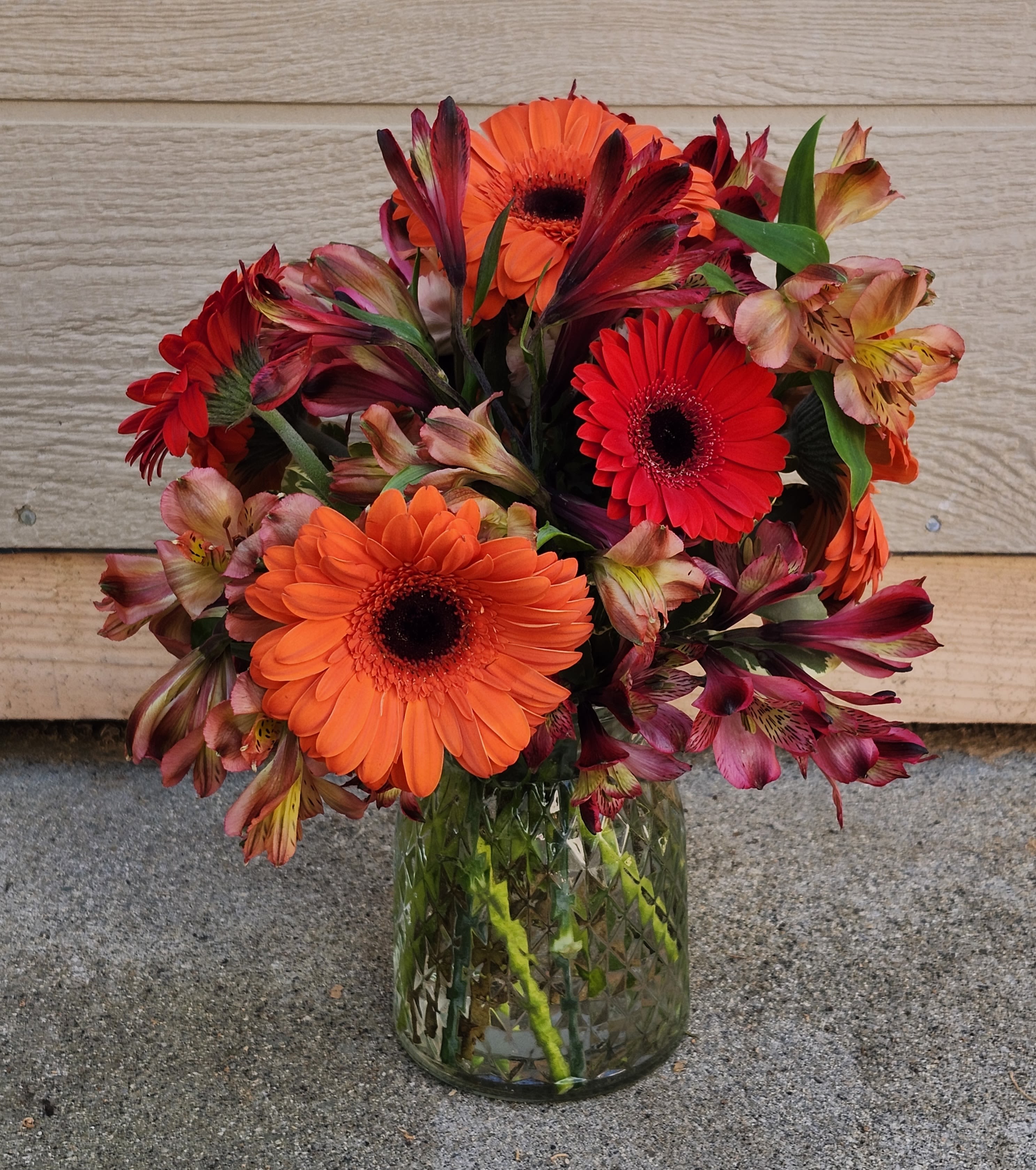 Gerbera Mix - Elegant mix of premium size Gerbera daisies orange and red with mixer of alstroemerias. Ready in cooler for same day delivery 
