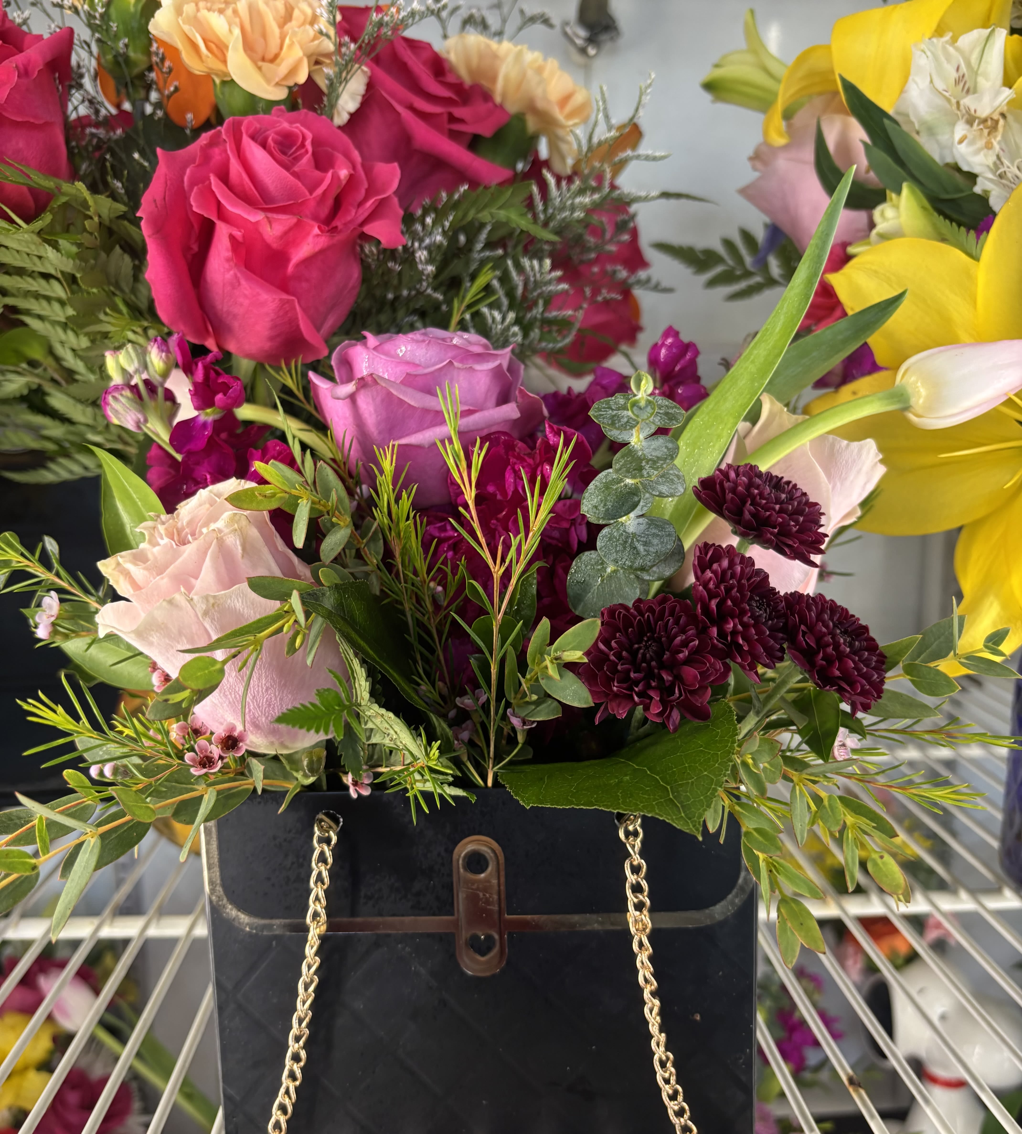 Black Little Purse  - Reasonable flower substitutions may be made due to availability