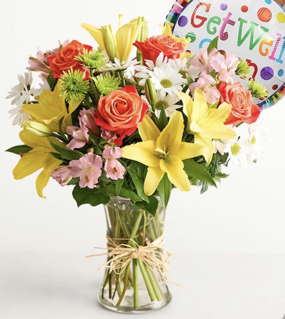 Fields of Europe Get Well - Bright, happy blooms for an instant pick- me- up! Our Get Well arrangement is gathered with a vibrant floral mix inspired by the hand- tied bouquets found in European markets. Paired with a colorful balloon, it's a thoughtful gift to lift their spirits. 