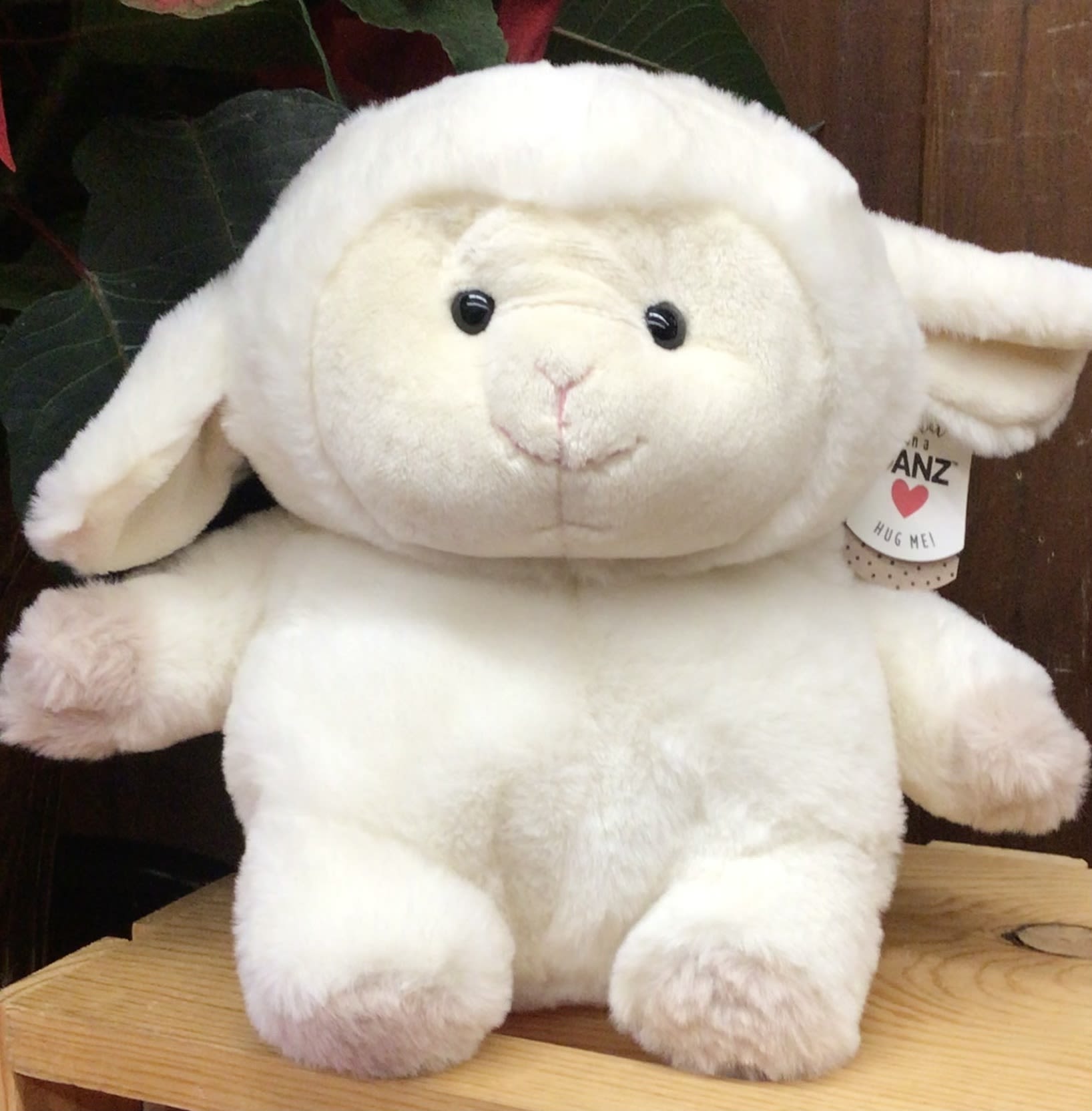 Plush white lamb stuffed animal with floppy ears