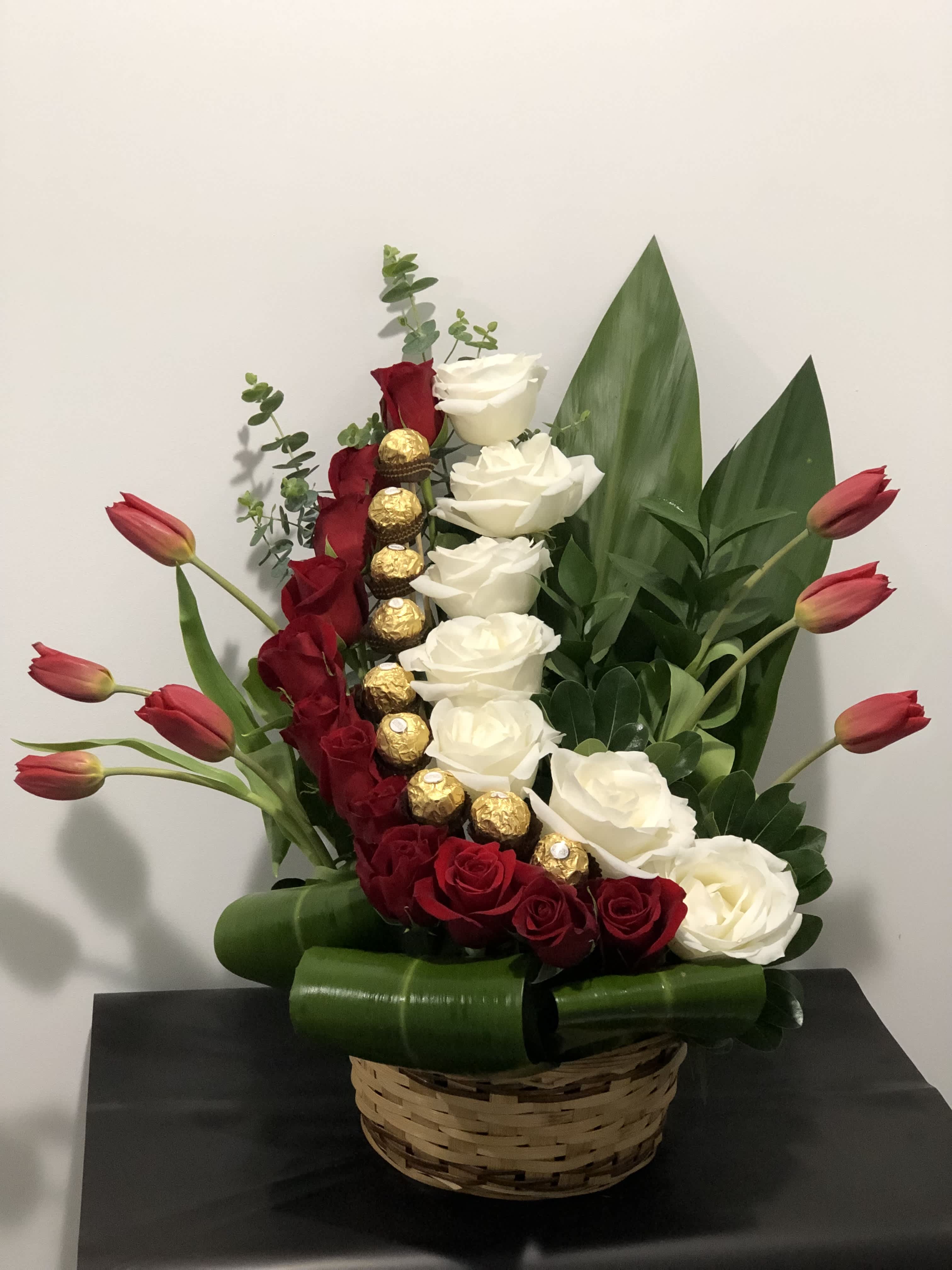 Cascade Floral Arrangement - Red &amp; White Roses, Tulips, and Ferrero Rocher chocolates. 