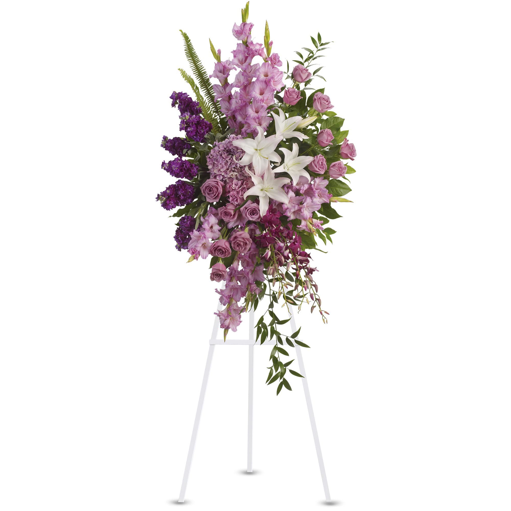 Tall purple and white floral standing spray on a white easel