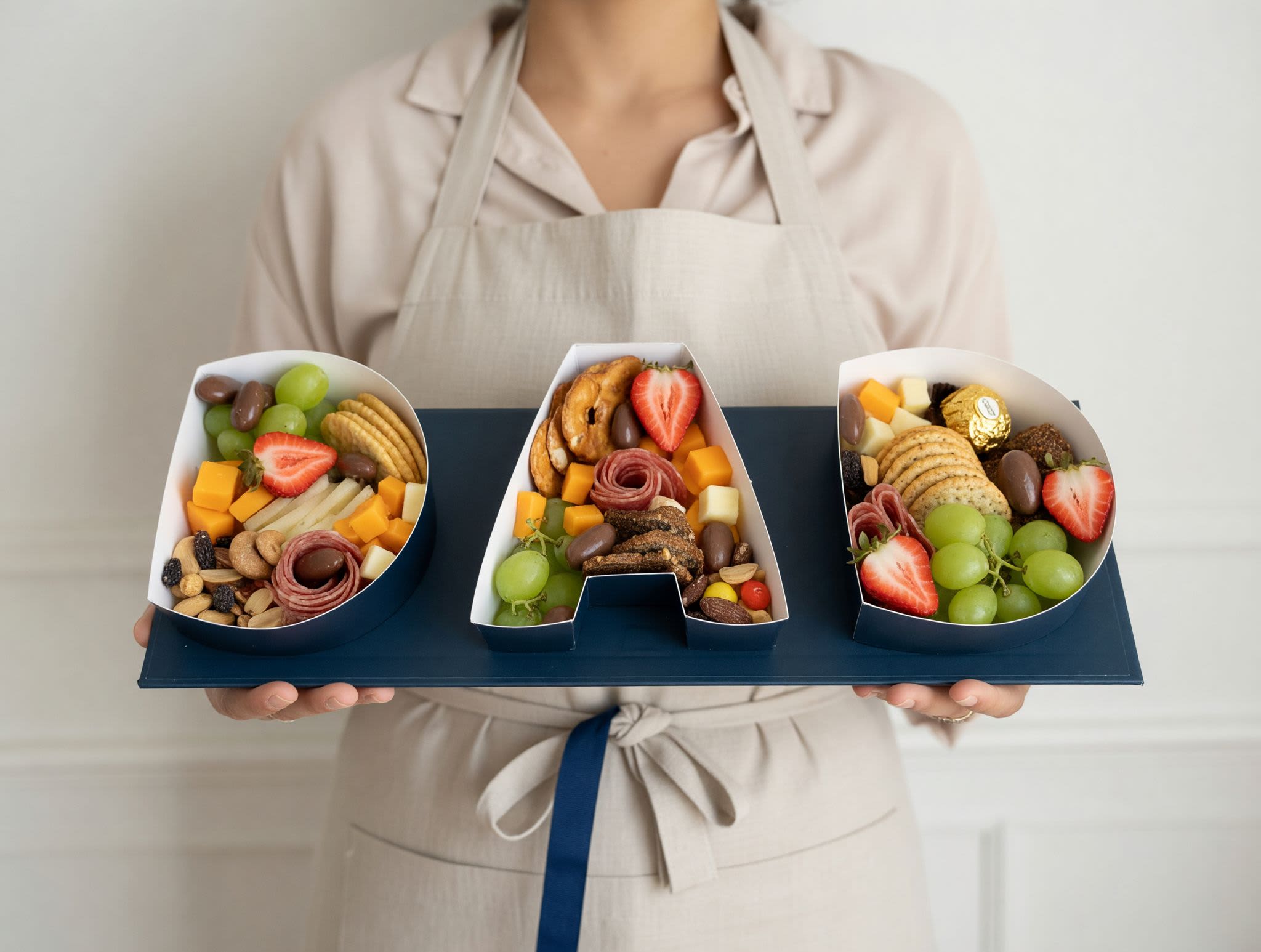 DAD Charcuterie Box - Different types of fruit, cheeses, nuts, meats