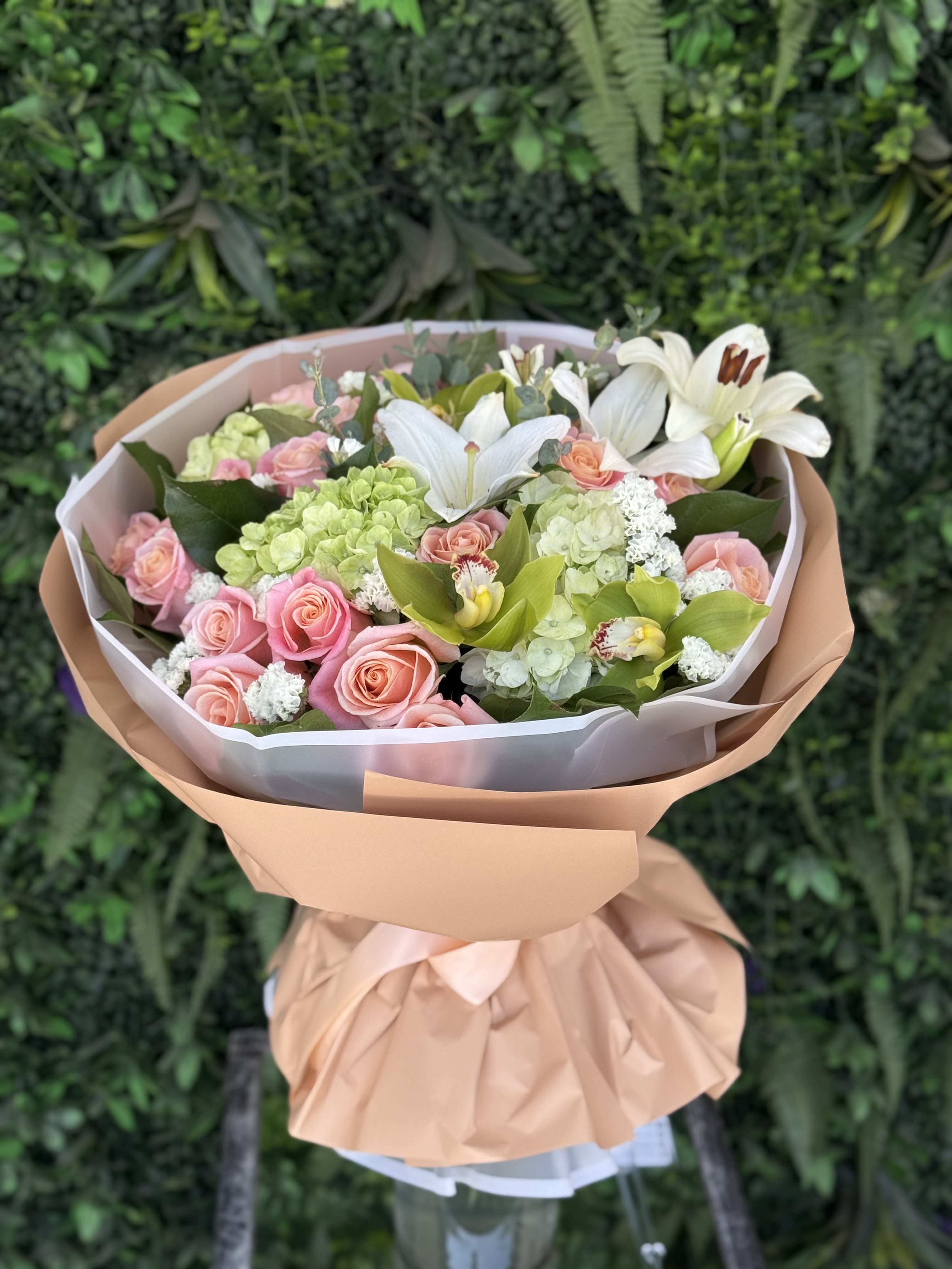 Fresh Aura - A bright and joyful bouquet, symbolizing warmth, positivity, and happiness. With their golden petals and vibrant energy, these blooms bring a sunny, uplifting touch to any moment