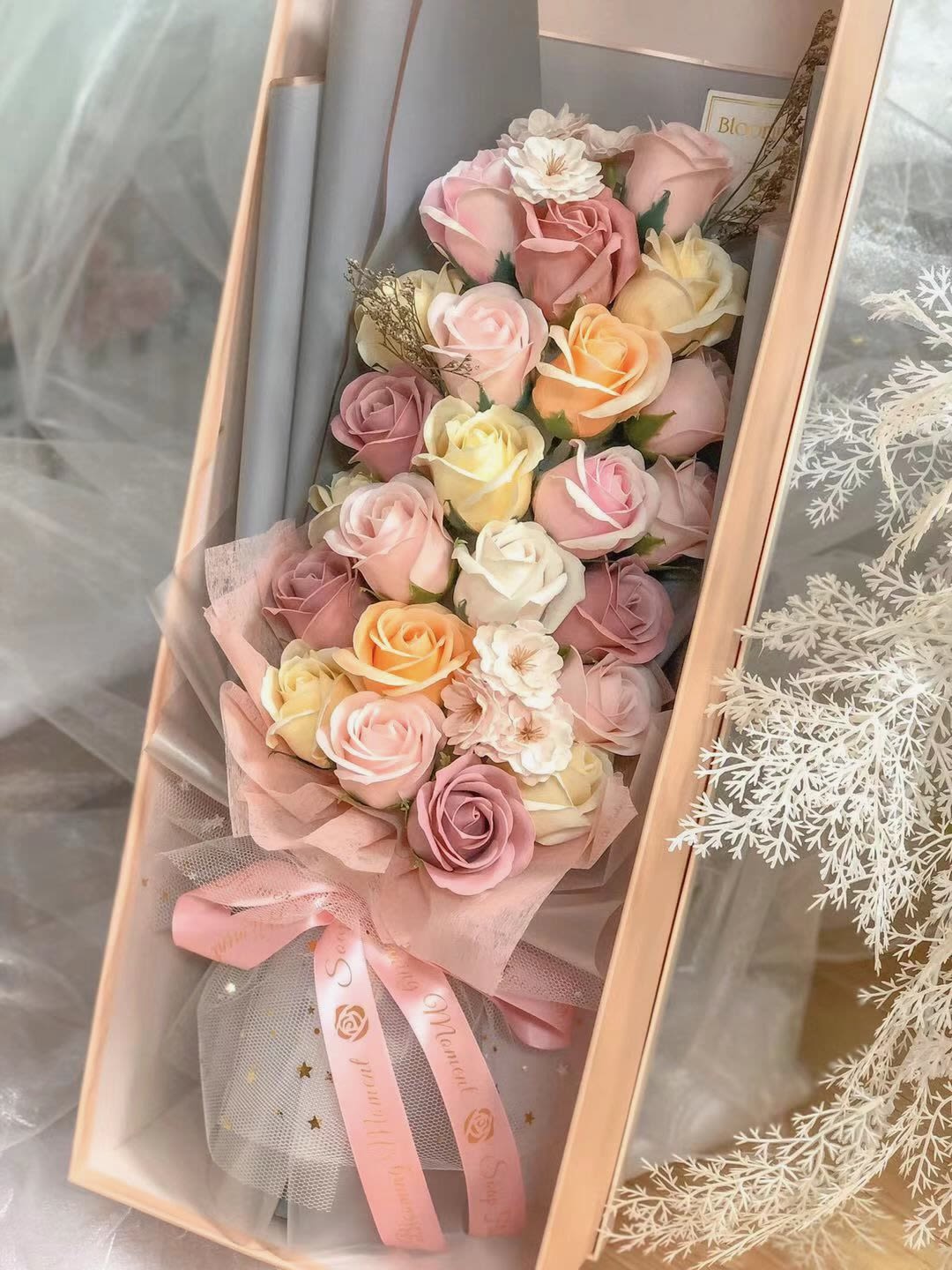 [SOAP FLOWER] Morandi Color Pallet Bouquet - Inspired by the timeless beauty of Morandi tones, this bouquet blends soft, muted hues of blush pink, dusty rose, cream, and gentle peach into a harmonious and sophisticated arrangement.  Designed with layered soap roses and delicate floral accents, this bouquet feels calm, romantic, and effortlessly elegant. The signature wrapping, paired with a structured presentation box, elevates it into a refined gift that’s both modern and luxurious.  Unlike fresh flowers, this soap flower bouquet is long-lasting and requires no maintenance, making it perfect for display as a lasting memory.  Key Features Morandi-inspired soft neutral color palette Premium soap roses with realistic texture Elegant boxed presentation for a luxury feel Long-lasting (3+ years with proper care) Light fragrance (optional) Perfect For Birthdays Anniversaries Romantic gifts Mother’s Day Home decoration