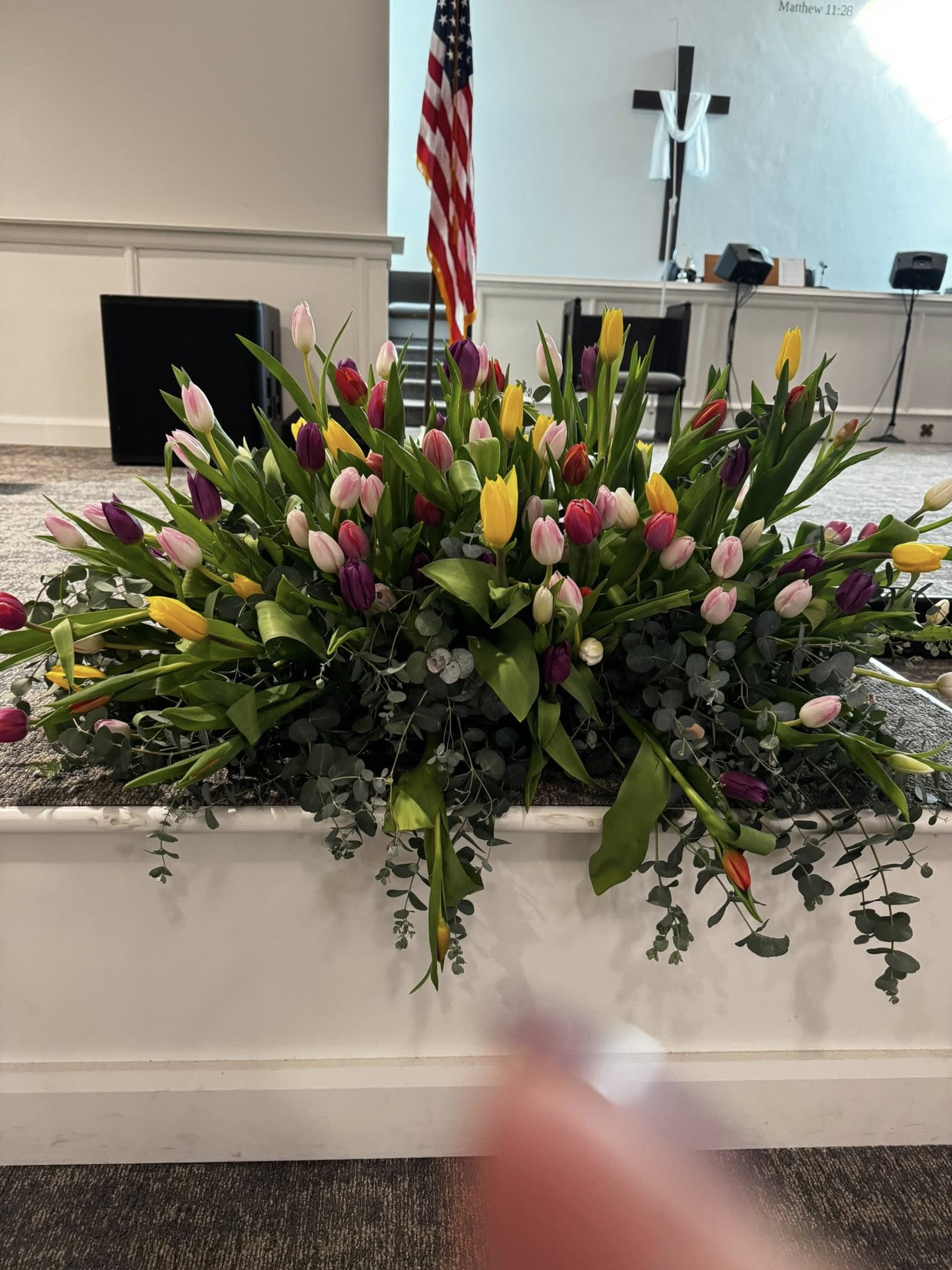 Custom Tribute - A custom casket spray designed as a heartfelt tribute to a life rooted in the love of flowers and nature. Created after an in-depth conversation about the deceased’s favorite blooms, cherished garden memories, and beloved colors, this arrangement reflects their unique personality and passion for fresh florals. Overflowing with carefully selected seasonal flowers in meaningful hues, the spray is styled with a natural garden-inspired elegance — lush, abundant, and full of life. Perfect for the devoted gardener or anyone who found joy and peace among flowers, this tribute serves as a beautiful final expression of their connection to nature and the beauty they cultivated throughout their life.