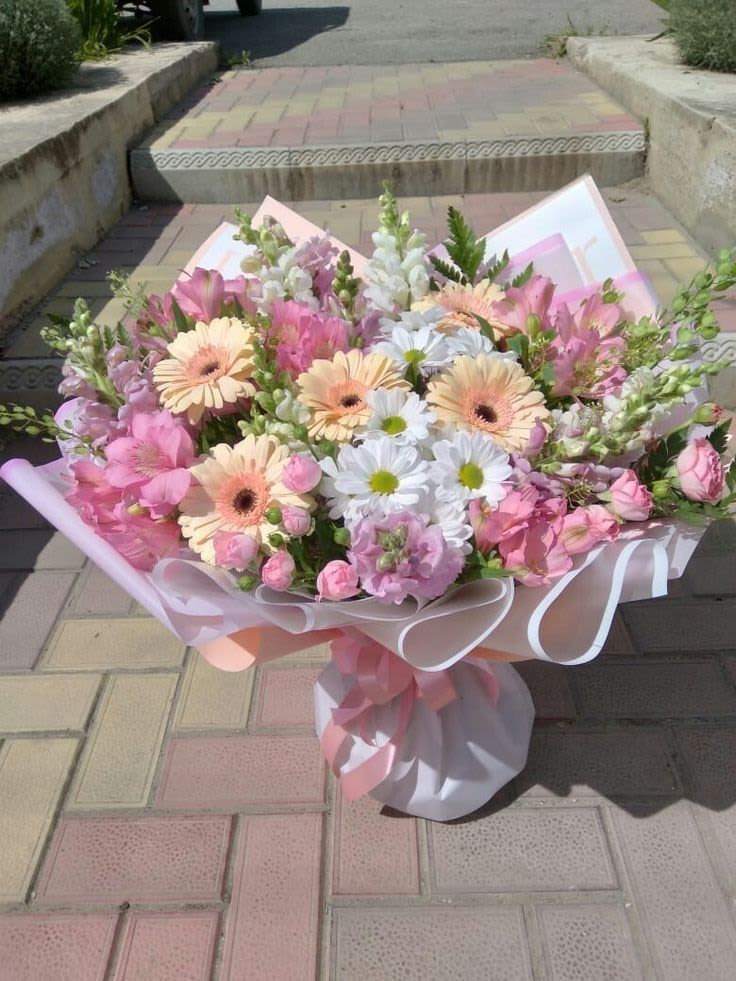 Pink and white mixed bouquet with gerbera daisies and snapdragons