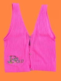 Bright pink pleated vest on an orange background