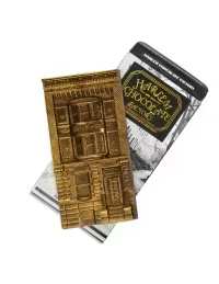 Two packaged chocolate bars, one gold-wrapped and one black-and-silver wrapped