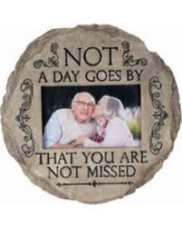 Decorative memorial plaque with a couple's photo and text