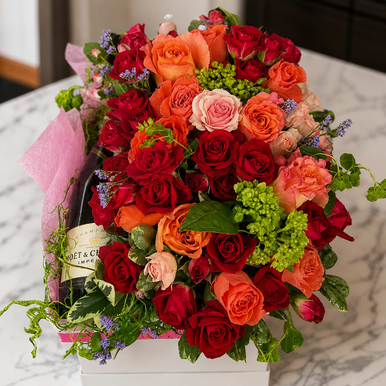 Sparkling Love Roses and Moet - Toast to love with this celebratory gift box! Moet and Chandon champagne is the perfect choice to show your love some love. Don't wait, celebrate today with the Sparkling Love gift box. Approximately 18"h x 12"w x 10'"t