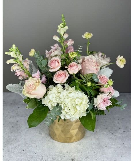 Prestige bloom design  - Hand selected hydrangeas and roses arrangement with sophistication,creating a soft yet luxurious floral ex Full of charm ad grace.