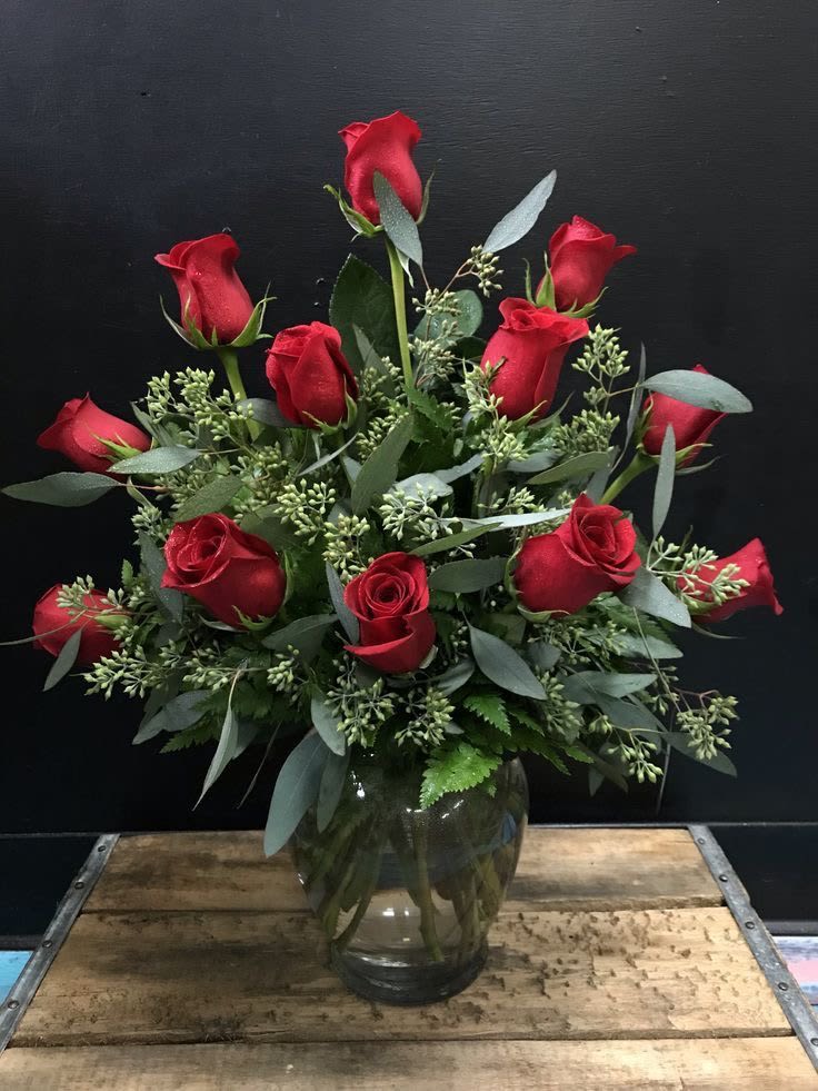 Fresh rmanc  - Hand selected red roses and eucalyptus arrange with artistry,creating a sophisticated and naturally luxurious floral statement.