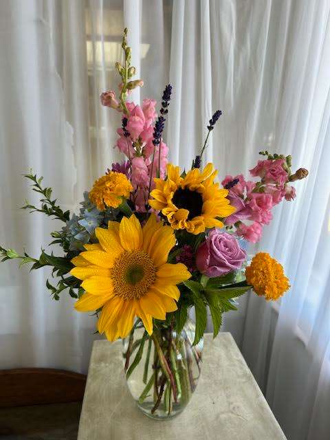 Mixed Sunflower Arrangement  - Brightly colored arrangement featuring vibrant sunflower. Contents of arrangement will vary based on inventory, call for details. 