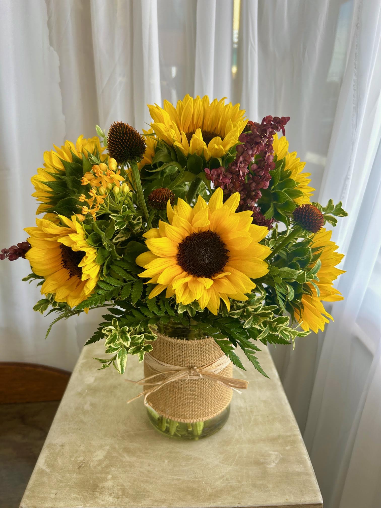 Sunshine + Sunflowers - The Oregon Coast is OFTEN cold, rainy, and gloomy.  So send some sunshine!