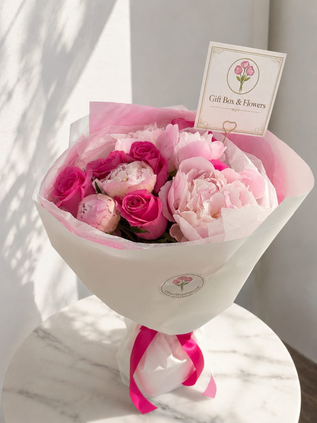     Peony Kiss - A romantic bouquet of soft pink peonies and premium hot pink roses, beautifully wrapped in Korean paper and luxury tissue. Handcrafted with care for birthdays, anniversaries, graduations, and life’s most special moments. Available for local flower delivery in Myrtle Beach, South Carolina.