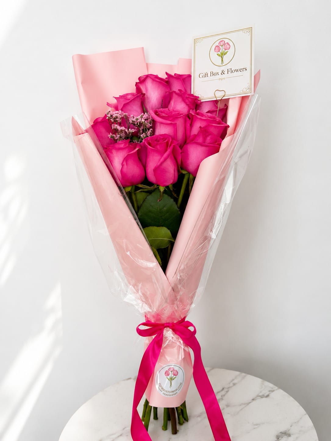 Pink Promis - A timeless bouquet of vibrant pink roses, elegantly wrapped in premium Korean paper and finished with luxury details. Designed to celebrate love, birthdays, graduations, and life’s sweetest moments. Available for local flower delivery in Myrtle Beach, South Carolina.