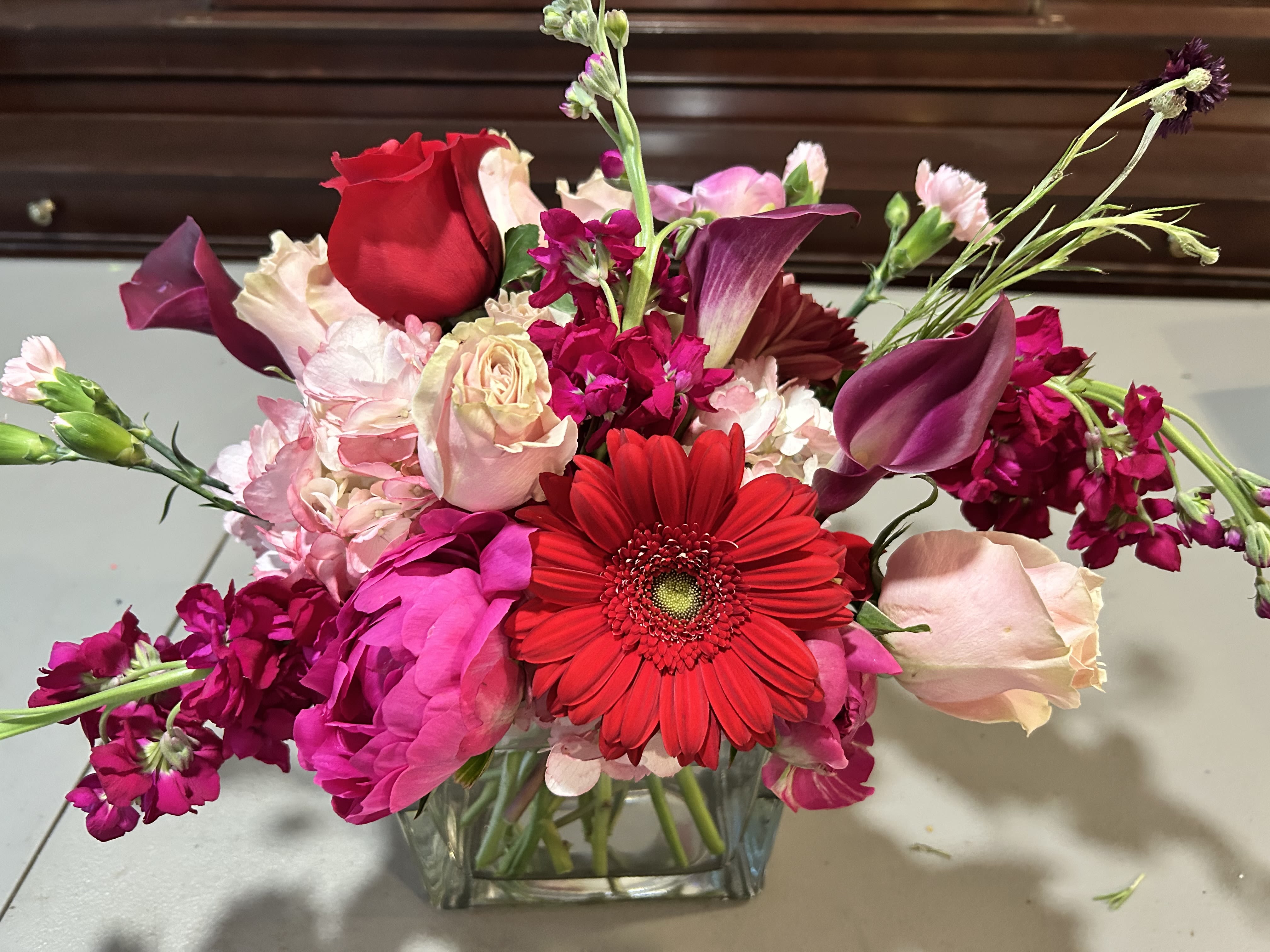 Happy Mother's Day - Make her day with this bouquet of peonies, roses, hydrangea and assorted pinks and burgundy!