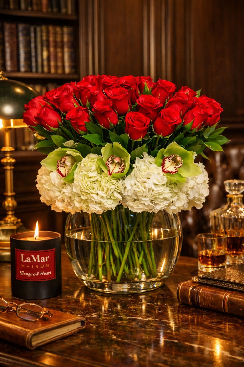 Red Brillance (E'clat Rouge) - Commanding yet sophisticated, E'clat Rouge captures the essence of timeless strength and style.Deep red roses rise above whte hydrangeas and green orhids. This arrangement speaks of confidence - the kind found in a gentleman's study, where detail matters