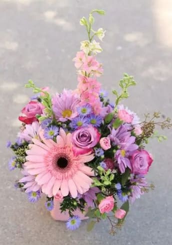 Pink and purple mixed bouquet with a large gerbera daisy