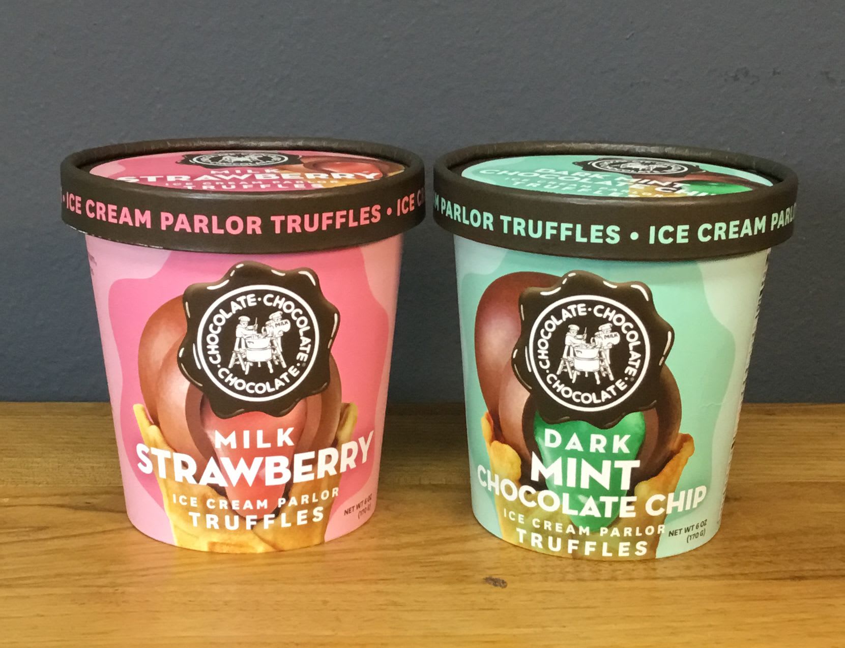 Ice Cream Truffles, 4 oz. - Rich, nostalgic dessert charm in a compact package - these 4 oz. Ice Cream Truffles  (milk strawberry pink, or dark mint chocolate chip green) that feel like a boutique ice cream parlor. Perfect as an add-on for a birthday, Mother's Day treat, or a "just because" surprise, the tubs' bold branding and dark lids give a cheerful pop of pink, green, white and black when paired with a bouquet.  Each tub holds premium ice cream paruffles with a sweet, dessert-forward presence ideal for gifting alongside flowers or on their own as a thoughtful thank-you or holiday treat. The retail-style packaging makes them easy to tuck into a gift bag or place beside an arrangement for an extra-special presentation.  Give this to someone who loves small indulgences - the person you're thinking of will feel noticed and celebrated without fuss. Sized to complement our bouquets, these 4 oz. tubs ship ready to pair with your order; no special care beyond enjoying them soon after delivery.