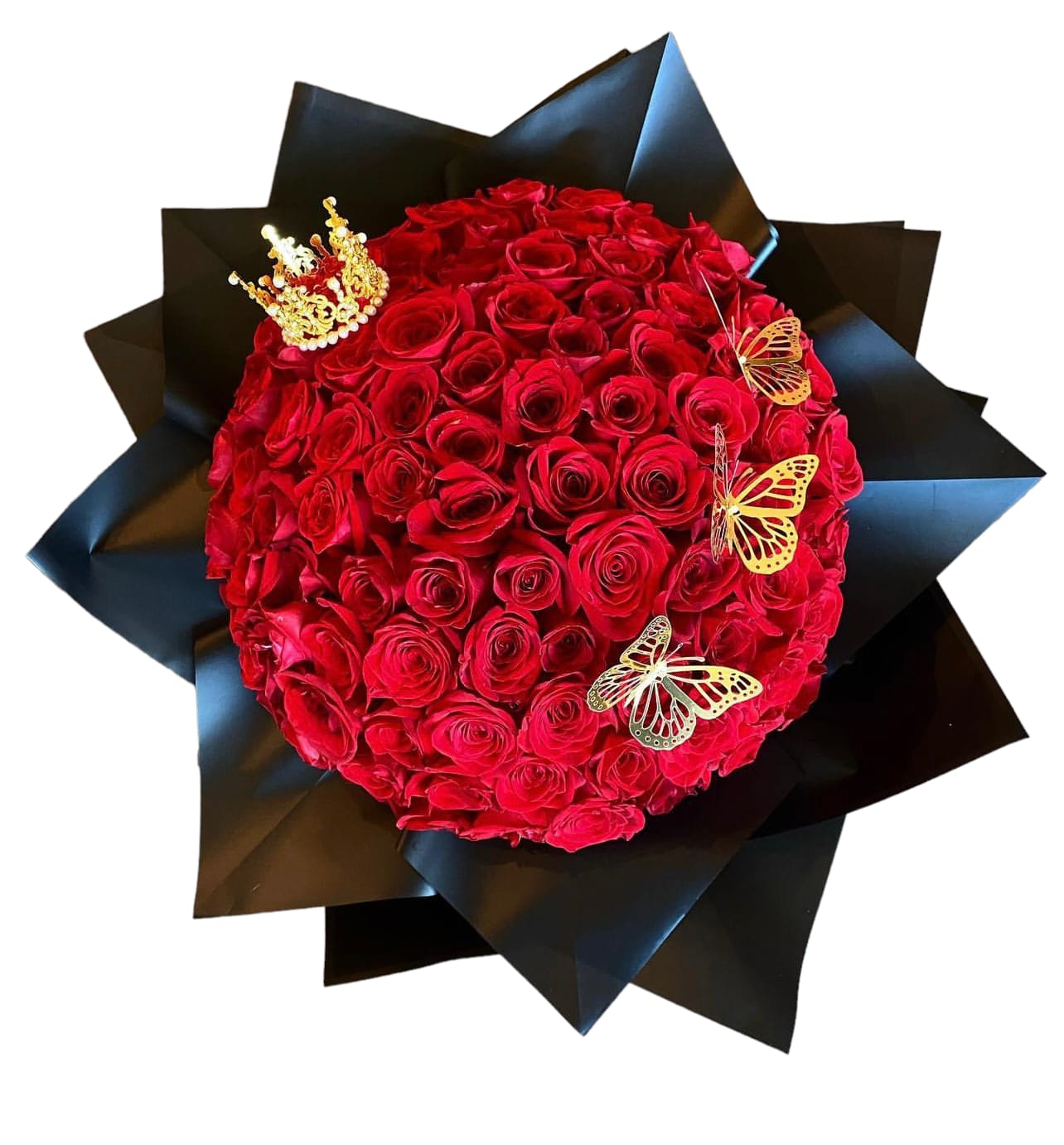 Round bouquet of red roses wrapped in black paper with butterfly accents