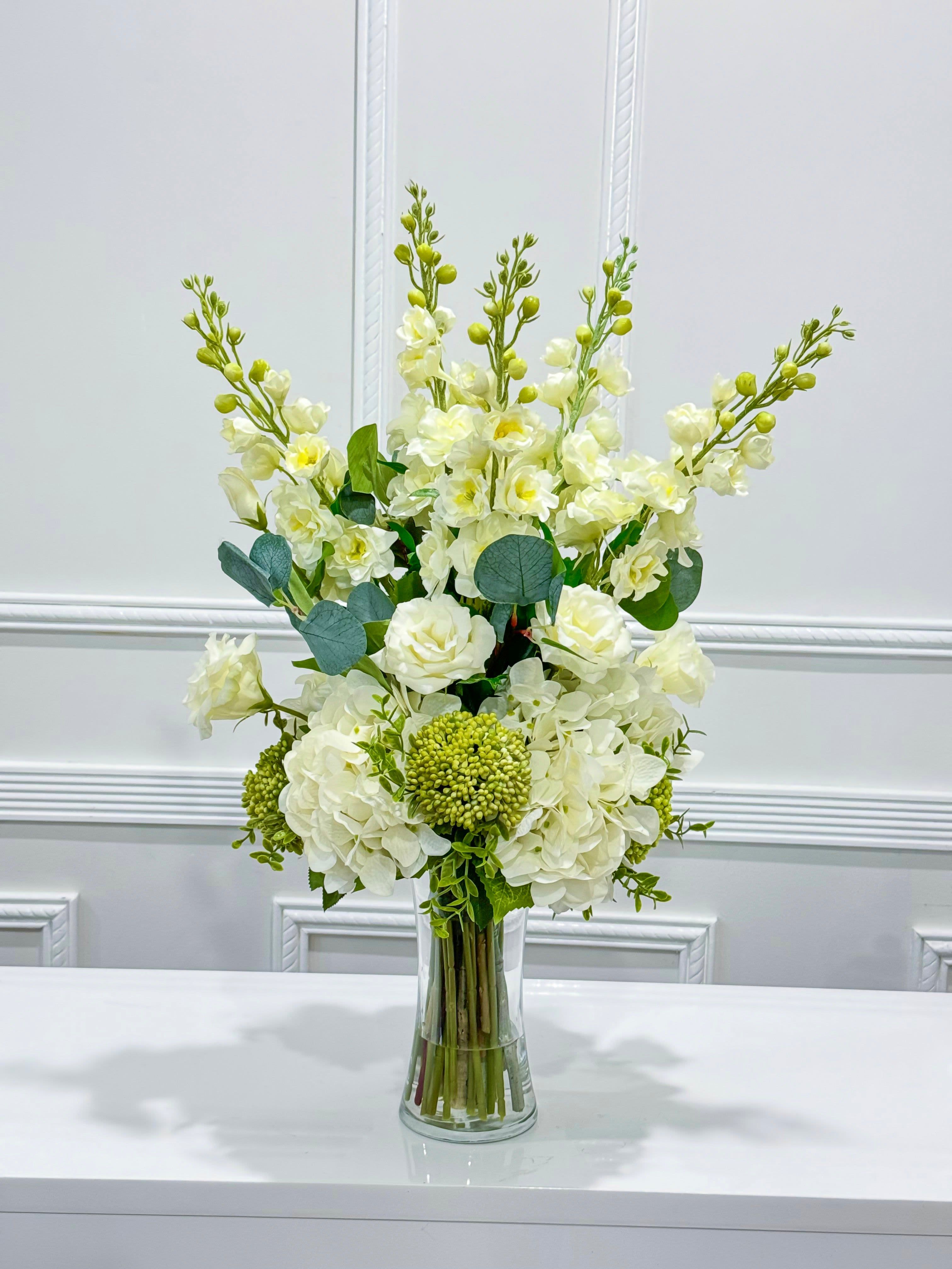 Sincerely Simple  - Nothing short of graceful, this elegant arrangement will be best at your next high-spirited occasion!  