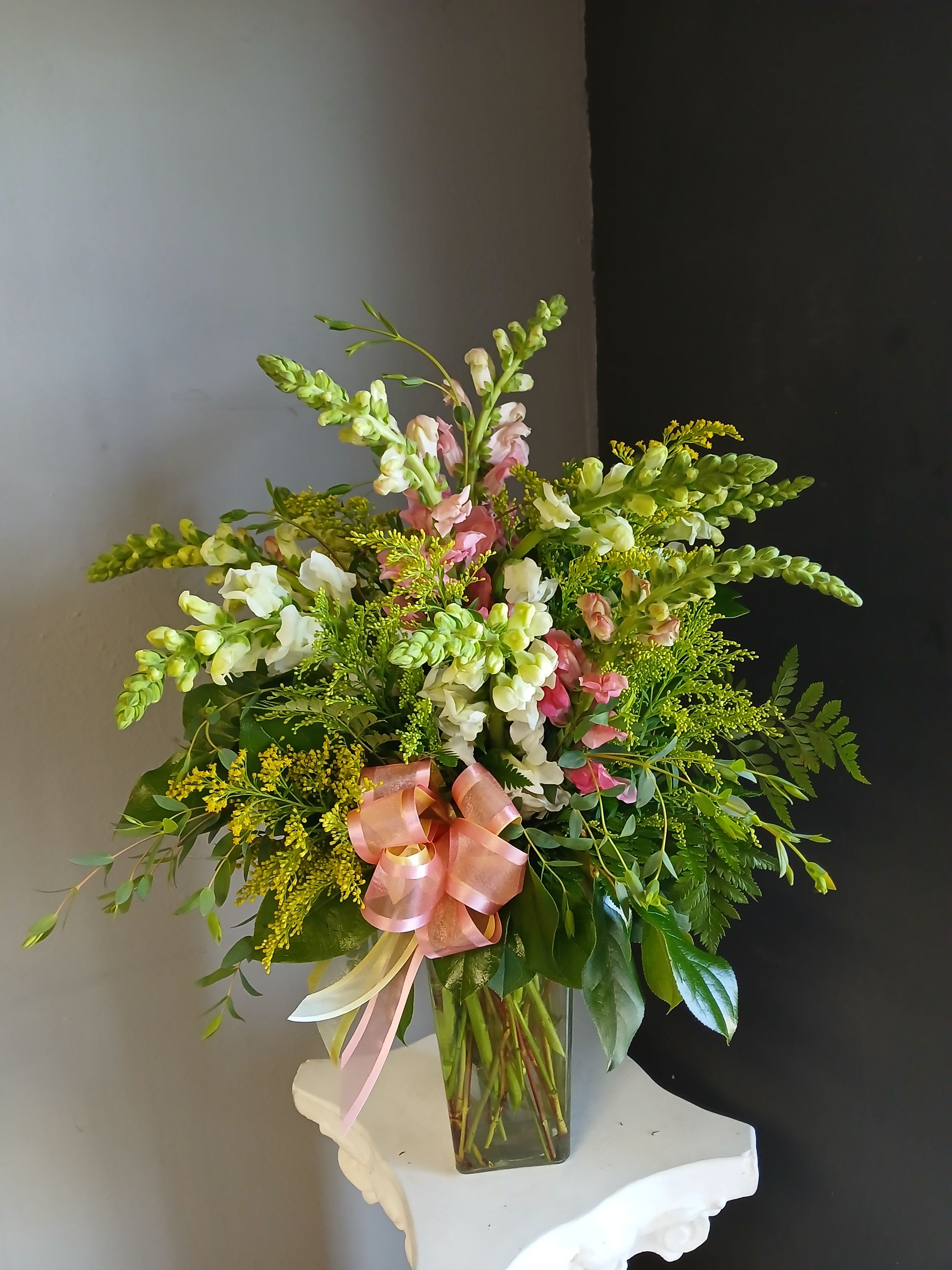 Snapdragons - Dizzy Dozens - One dozen gorgeous, mixed colored snapdragons. Designed in a vase with greens and filler. Flower color and filler will be based on available stock.