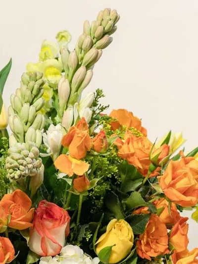 Designer's Choice Tall Seasonal - A tall, artfully composed expression of the season, our Designer’s Choice Seasonal Tall Arrangement highlights the freshest blooms and textures available at their peak. Each design is thoughtfully crafted with a curated mix of premium seasonal flowers — from vibrant spring stems to lush summer botanicals, rich autumn tones, or elegant winter whites — paired with complementary greenery for height and movement.