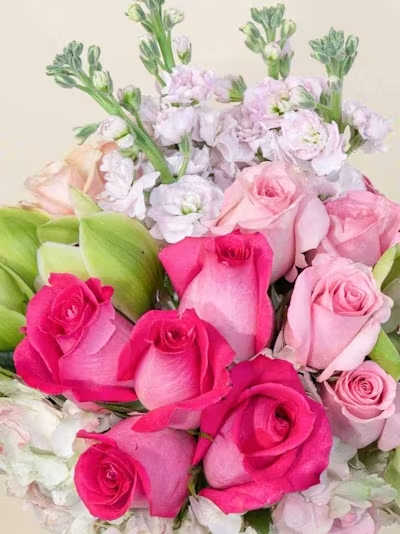 Designer's Choice Pink Tall - A graceful, feminine expression of beauty, our Designer’s Choice Pink Tall Arrangement is designed in a luxurious palette of pinks — from soft blush and ballet tones to vibrant rose and deep raspberry. Each piece is artfully composed with premium seasonal blooms chosen fresh by our designer for height, texture, and romantic presence.  Arranged in an elongated, sculptural silhouette, this design feels airy, elegant, and full of movement. Its tall profile creates a captivating statement, perfect for celebrations, heartfelt gestures, or adding a refined touch of pink‑hued charm to any space.