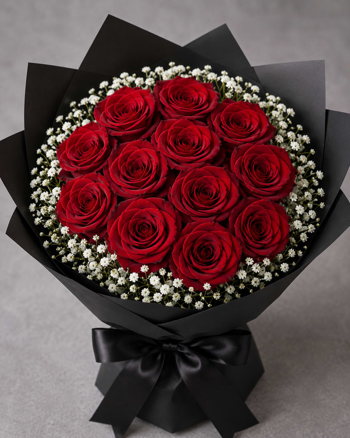 Red Explorer Rose Bouquet - Red Explorer Rose Bouquet  Bold, passionate, and timeless, this bouquet showcases premium Red Explorer roses, celebrated for their rich crimson color, velvety petals, and impressive bloom size. Known as one of the most sought-after red roses, Red Explorer symbolizes deep love, romance, respect, and devotion, making it a meaningful gift for life’s most special moments.  The luxurious blooms create a striking and elegant presentation that captures attention instantly. Their classic beauty and long-lasting freshness make them a favorite choice for anniversaries, romantic celebrations, Valentine’s Day, birthdays, or simply expressing heartfelt emotions.  With their intense red hue and sophisticated appearance, Red Explorer roses represent enduring love and admiration while adding a touch of luxury and elegance to any setting. This bouquet is designed to make a lasting impression and create unforgettable memories.  ️ Symbolism: Love, Passion, Devotion, Romance, Respect, and Commitment.  Rose Variety: Premium Red Explorer Roses.  Perfect For: Anniversaries, Valentine’s Day, Romantic Gestures, Birthdays, Celebrations, and Special Occasions.