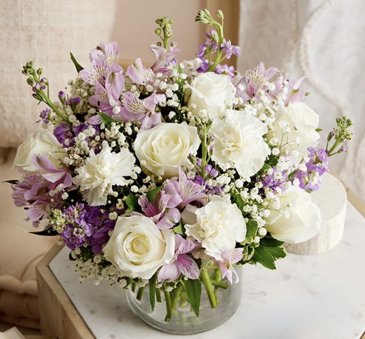 The Pretty In My Bubble - Our lovely mix of roses, carnations, alstroemeria, baby’s breath and more in a simple bubble fishbowl vase is fit for any occasion 