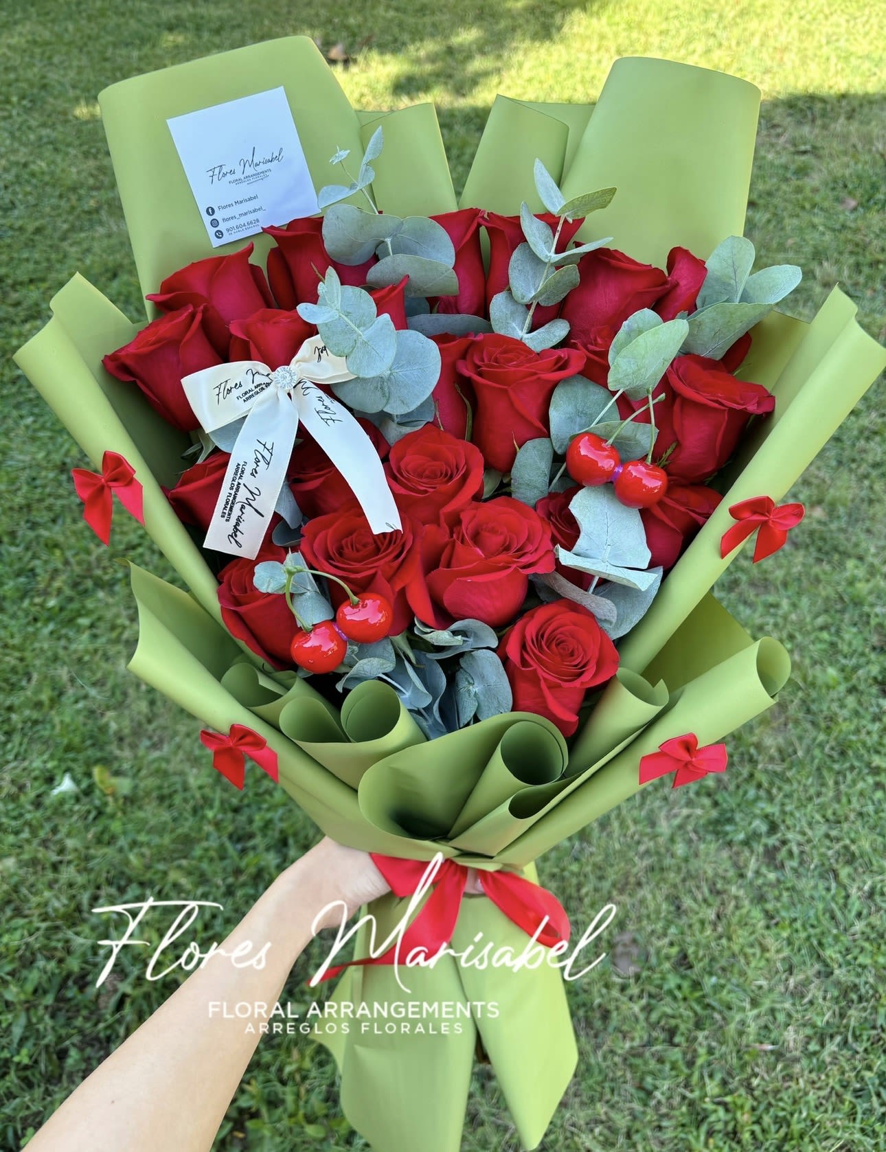 La cherry 24 roses  - 24 red roses. With cherries and filler. Green paper. 