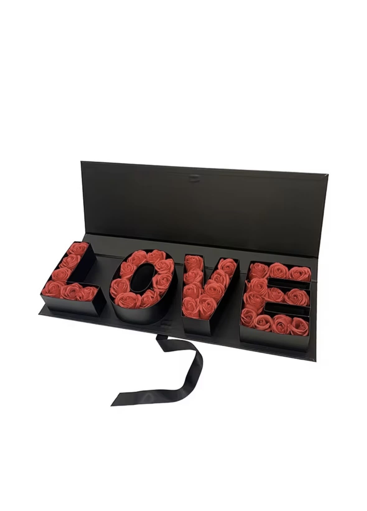 Eternal Love Rose Letter Box - Make a powerful statement with our Eternal Love Rose Letter Box — a luxurious floral design that spells out “LOVE” using perfectly arranged premium red roses inside a sleek black box. This piece is created for those who want more than just flowers — it’s a visual expression of emotion, passion, and elegance. The contrast between deep red roses and the modern black structure gives this design a bold, high-end look, perfect for clients who appreciate refined aesthetics. Ideal for romantic gestures, anniversaries, proposals, or unforgettable surprises, this arrangement delivers both impact and meaning. Each box is carefully handcrafted to ensure symmetry, freshness, and a flawless presentation.