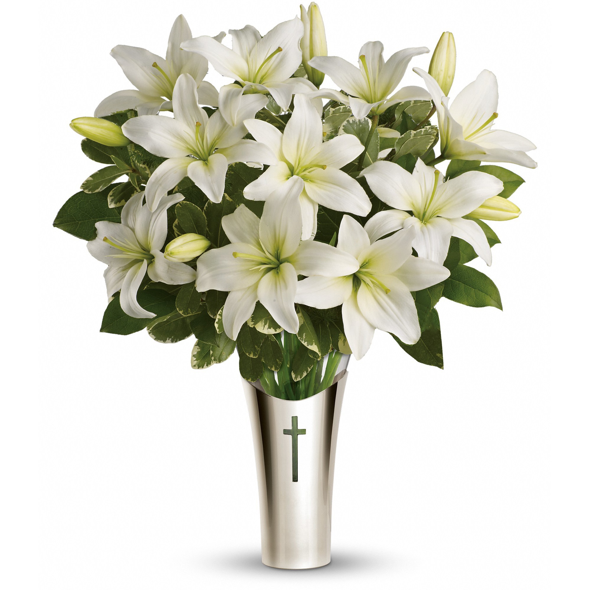 White lilies arranged in a tall silver vase with a cross emblem