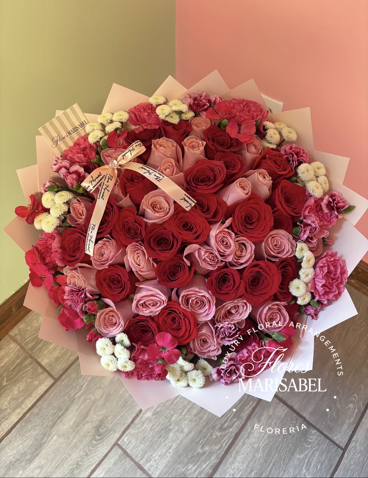 Mi Rosita  - 50 pink roses with flower rim (flowers will vary) pink paper 