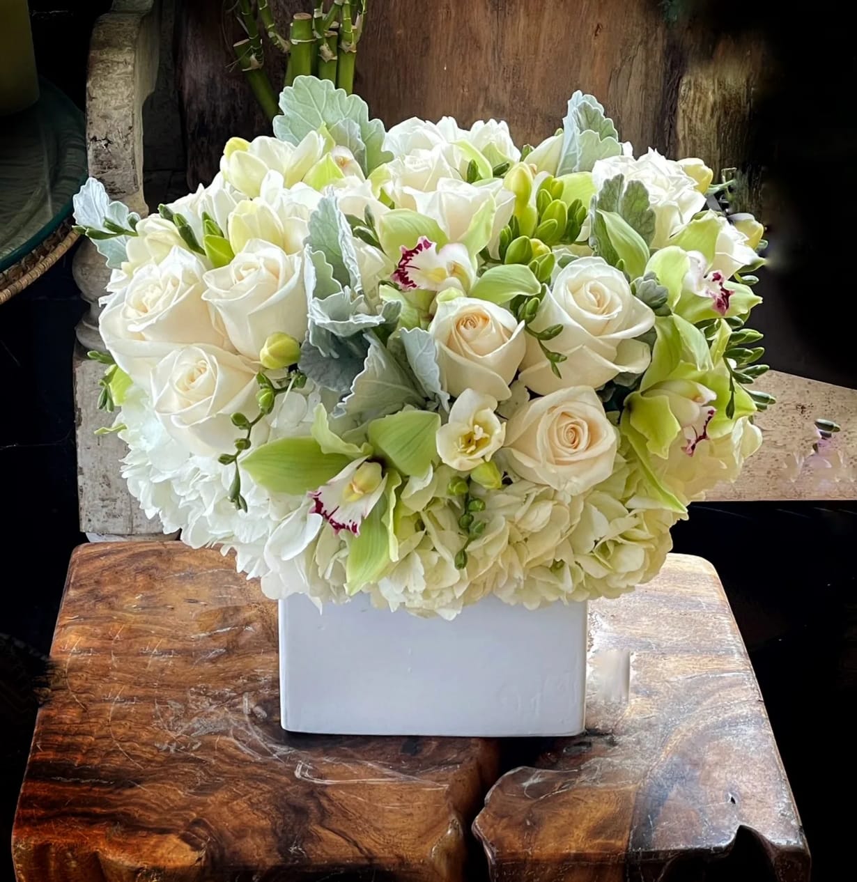 White Harmony - Hydrangeas, White Roses, White Tulips, cymbidium Orchid.