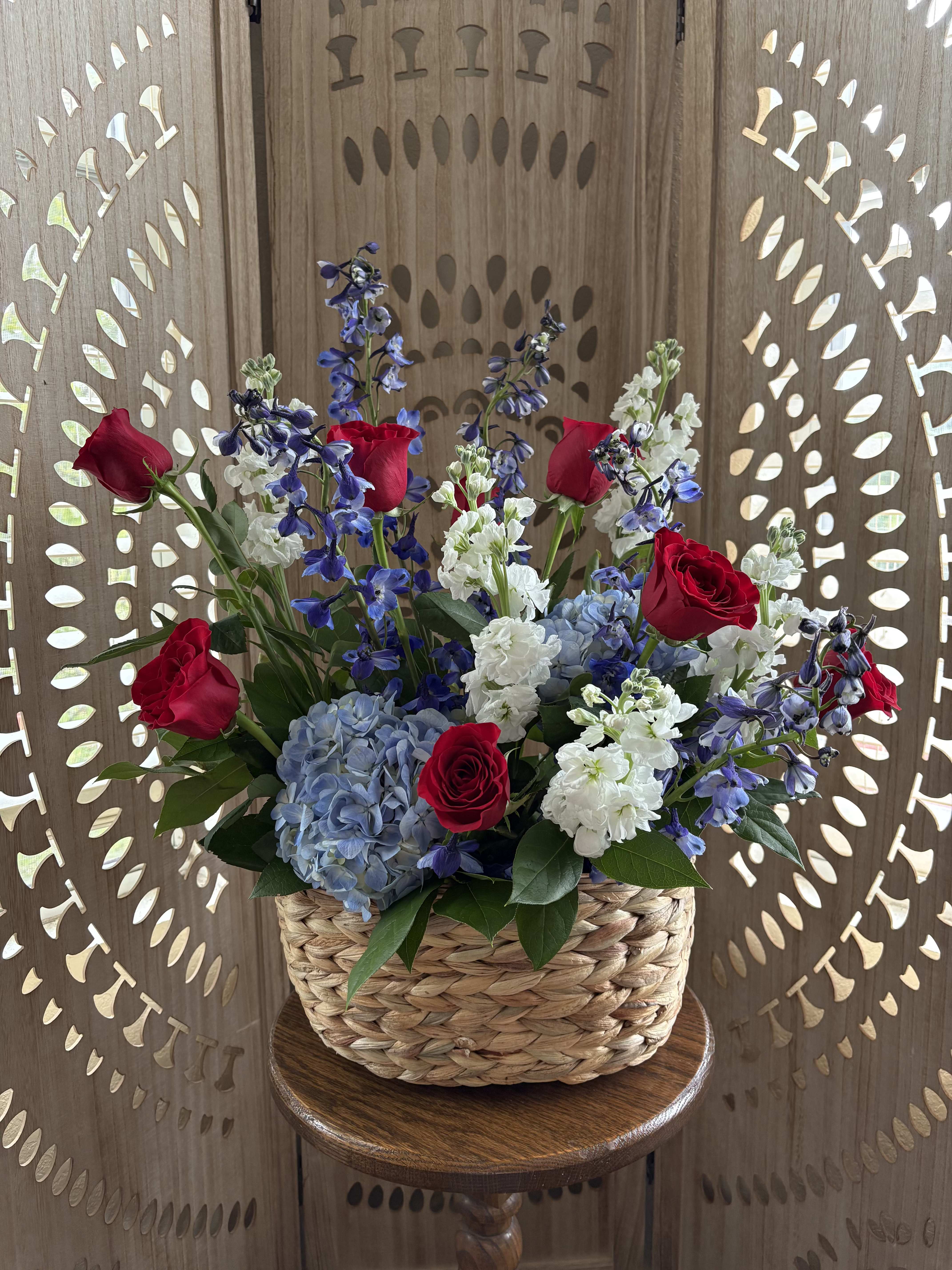 Stars Over Texas - Inspired by summer nights, open skies, and Hill Country celebrations, Stars Over Texas features a vibrant blend of red, white, and blue blooms designed in a garden-inspired style. Whether sent as a patriotic tribute, a celebration of service, or simply to brighten someone's day, this arrangement brings together bold color, heartfelt sentiment, and timeless beauty.