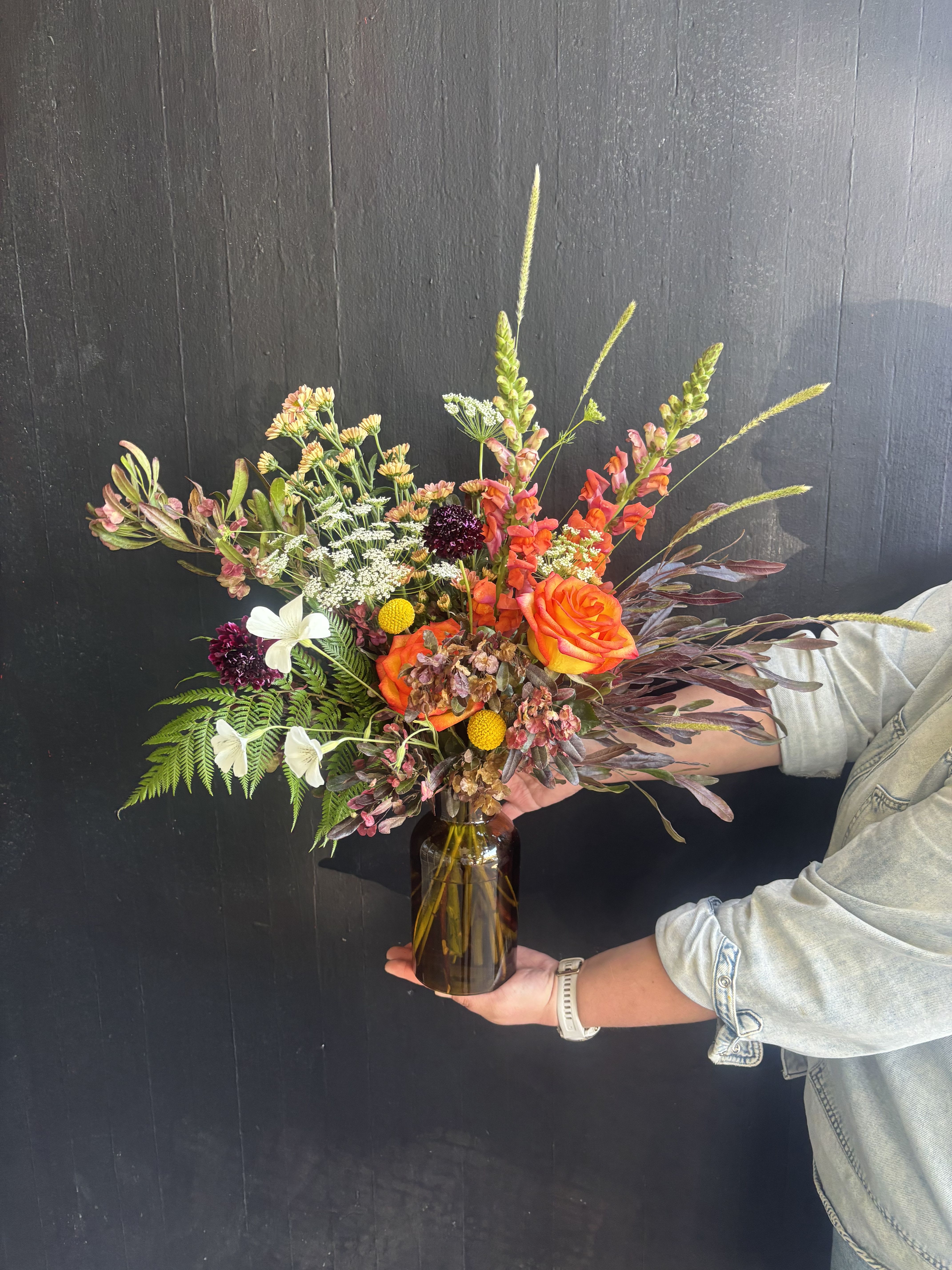 From the Garden - A mix of unique flowers like scabiosa, Queen Anne's Lace and snapdragons.   Our "Designs of the Week" collection offers a seasonal selection of fresh flowers. These arrangements will be updated weekly,  with fresh and fun designs that will change with the season. Our goal is to  always offer a new look and feel in every design. Enjoy the early availability of the freshest seasonal flowers and foliage while they are in season! 