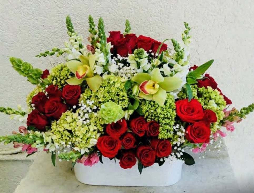 Timeless Elegance Floral Arrangement - Luxury flower arrangement handcrafted with premium red roses, green orchids, hydrangeas, snapdragons, seasonal blooms and elegant greenery designed by Snyder Flower Shop in San Antonio TX. Perfect for anniversaries, birthdays, sympathy flowers, romantic occasions, congratulations, luxury gifts and special celebrations with same day flower delivery in San Antonio. Our local florist specializes in custom floral arrangements using fresh roses, orchids, lilies, tulips, ranunculus, hydrangeas and premium flowers for every occasion. Proudly serving Stone Oak, North Central San Antonio, Medical Center, Alamo Heights and surrounding areas.