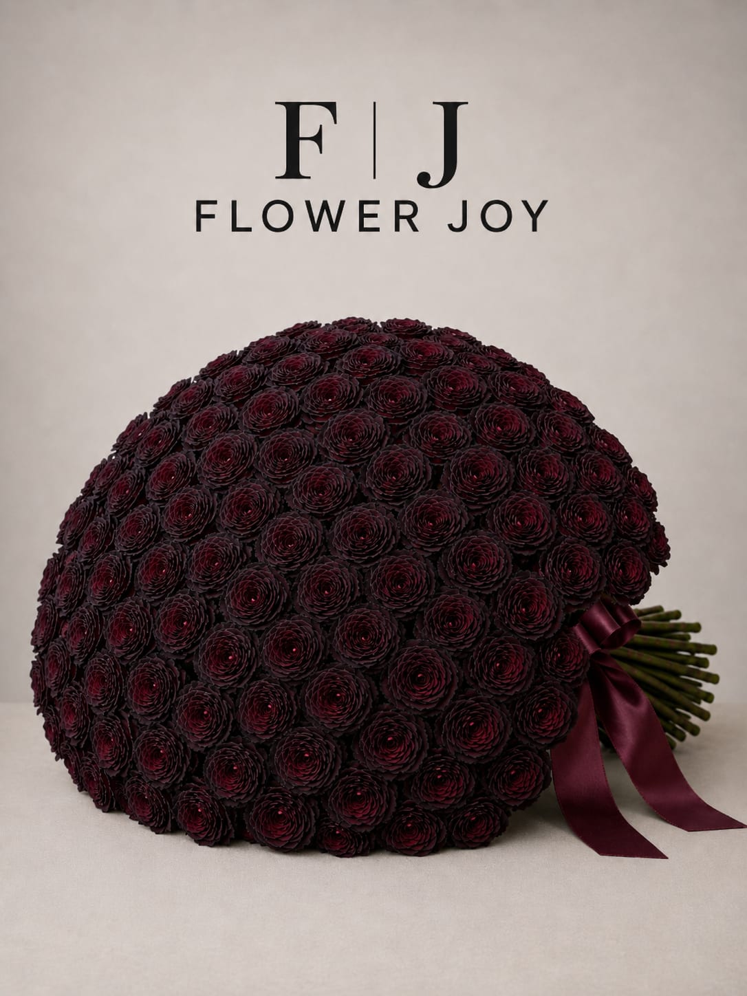 Midnight Romance Bouquet (101 Roses) - A dramatic arrangement of 101 deep burgundy roses, hand-tied with an elegant satin ribbon. Rich, luxurious, and unforgettable, perfect for romantic celebrations, anniversaries, or a truly meaningful surprise.
