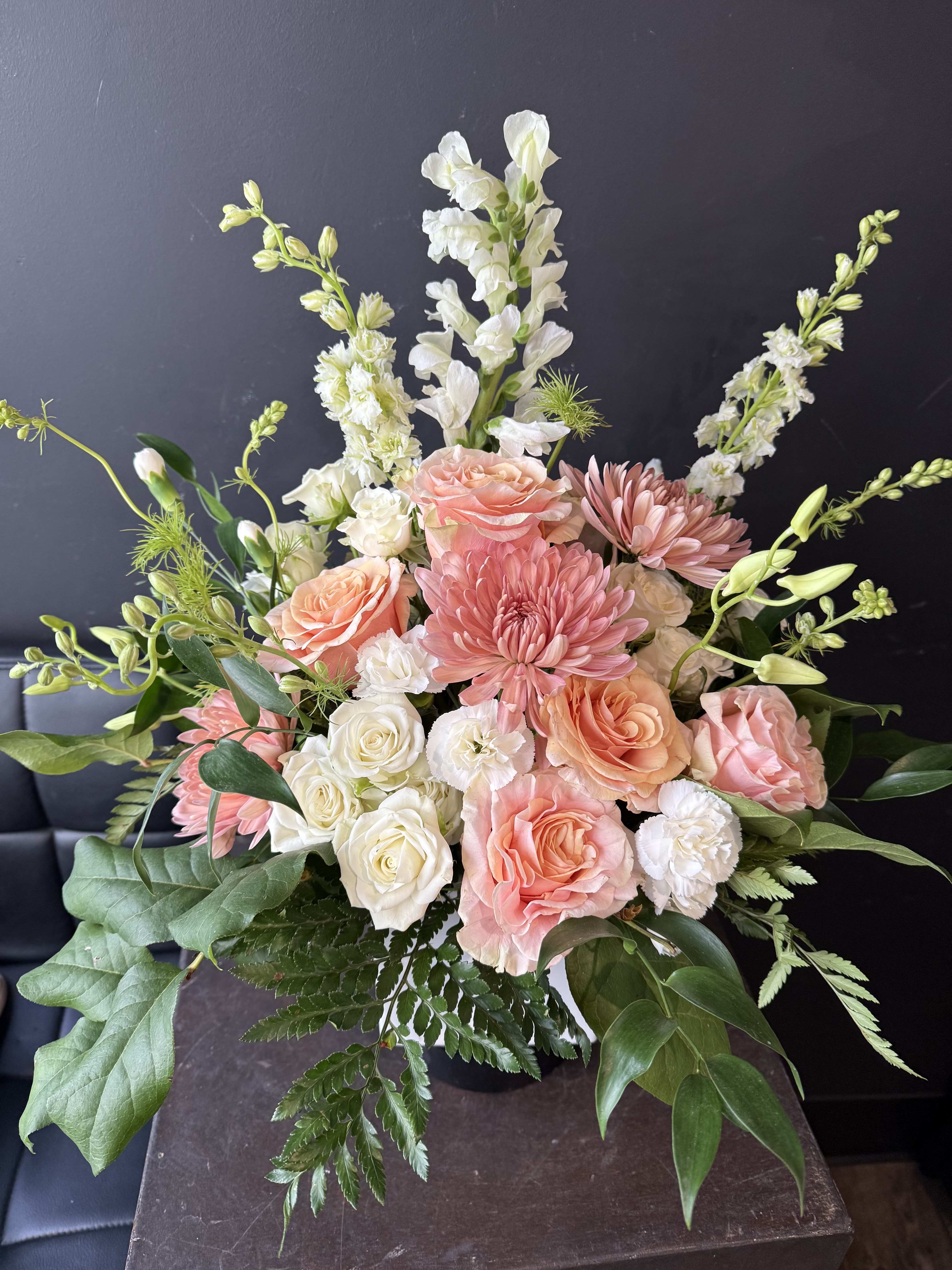 Just Peachy - Luxury Line with florals similar to photo   All Florals Pending Market availability - We will Make flower substitutions for what is similar and market available.  The photo pictured is for inspiration for the designer to complement.  