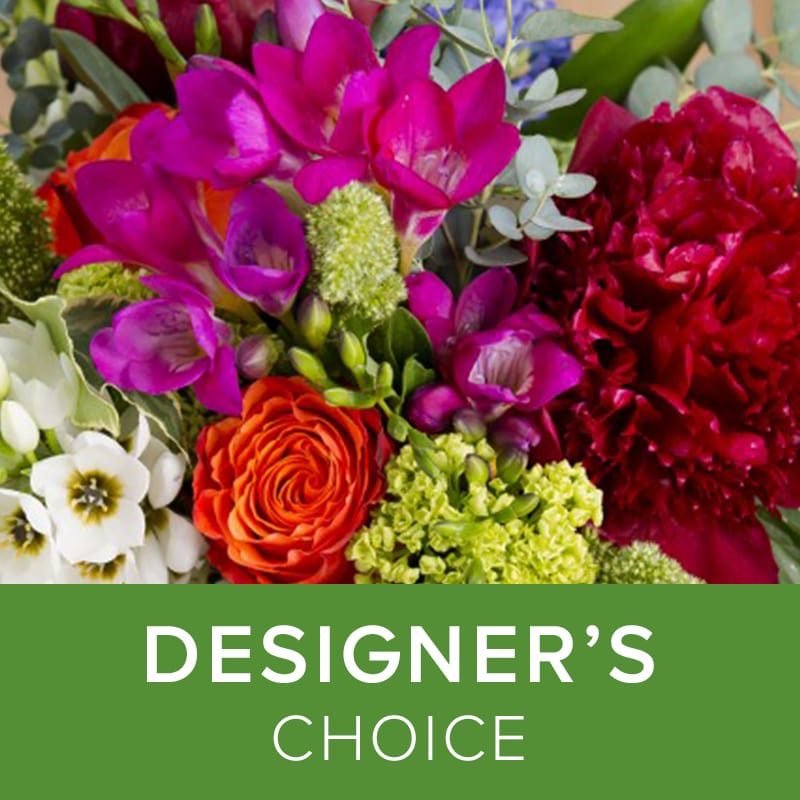 Mixed bouquet with magenta, red, orange, and white flowers