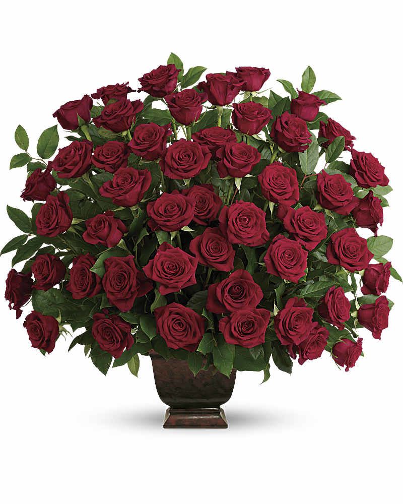 Rose Tribute - As true as the love symbolized by a red, red rose is the heartfelt memories and deep feelings embraced with this classic and elegant expression of tribute. Three dozen red roses, accented by salal, are presented in an exclusive Noble Heritage Urn.