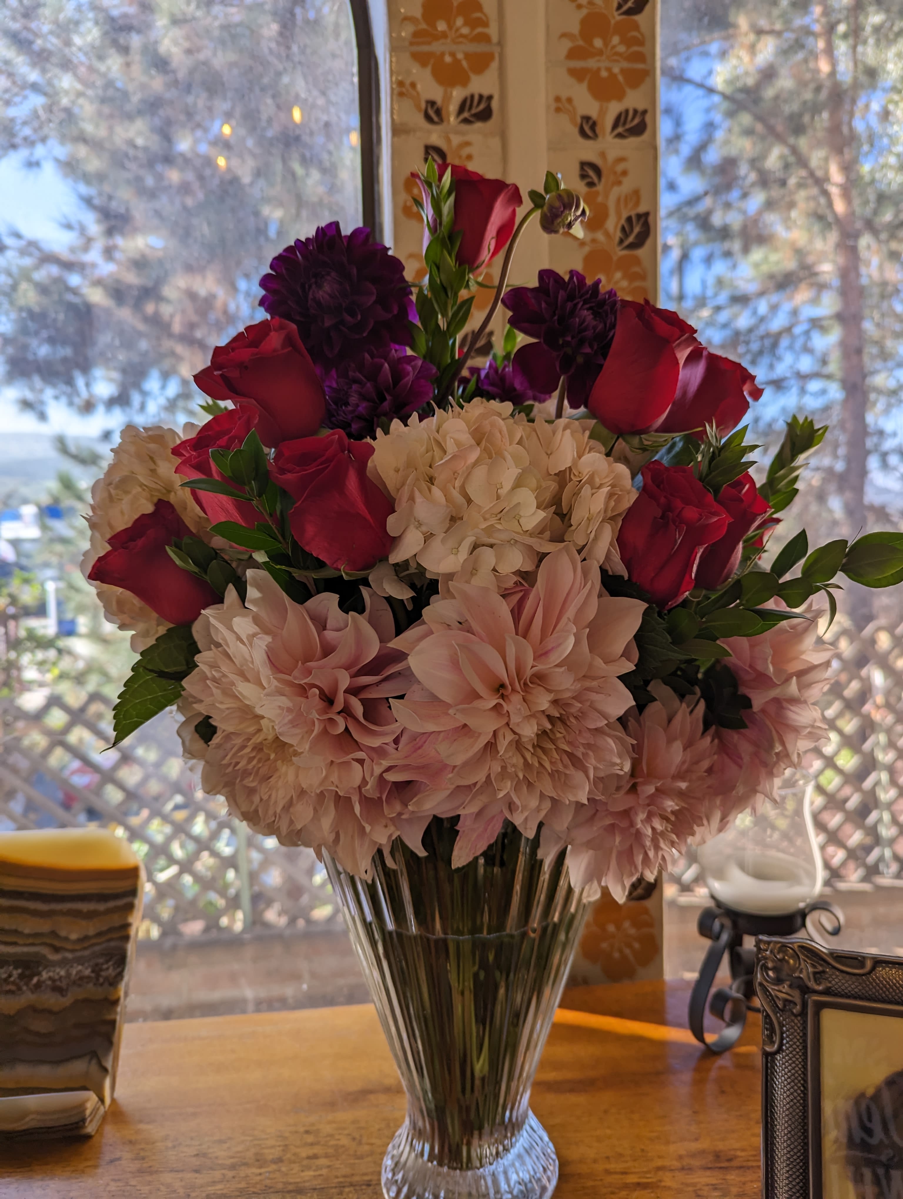 Blush colors - Premium roses with hydrangeas and a variety of dahlias. 