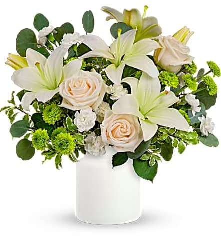 Eternally Elegant - This ethereal arrangement is a calming, peaceful gesture that shows them you care. Elegant white blooms accompany a timeless matte white vase. All Around Design Approx. 16 W x 16 H
