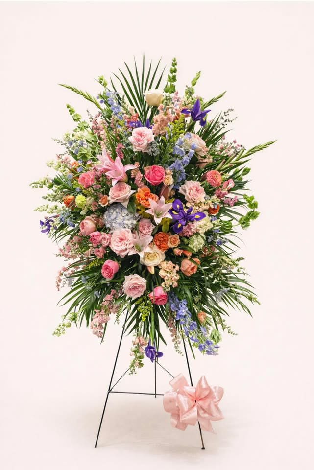 Sacred Garden - Designed with premium blooms in soft, comforting hues, this elegant arrangement serves as a heartfelt tribute to a life beautifully lived and deeply cherished.